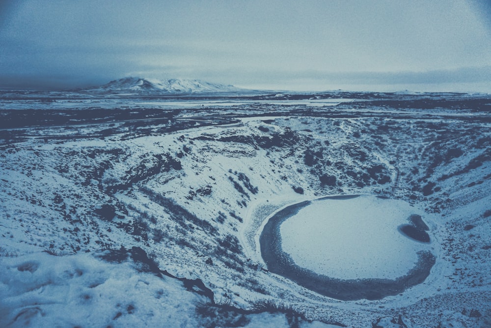 snow covered field during daytime