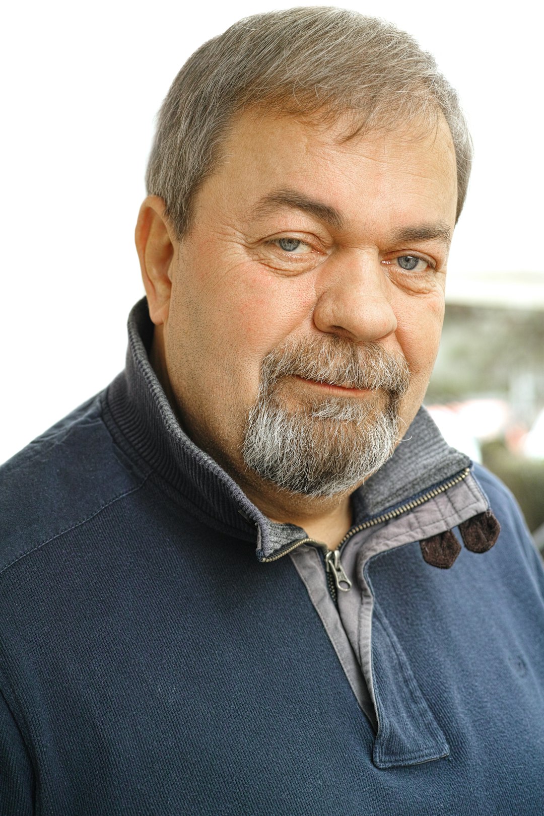 man in blue button up shirt