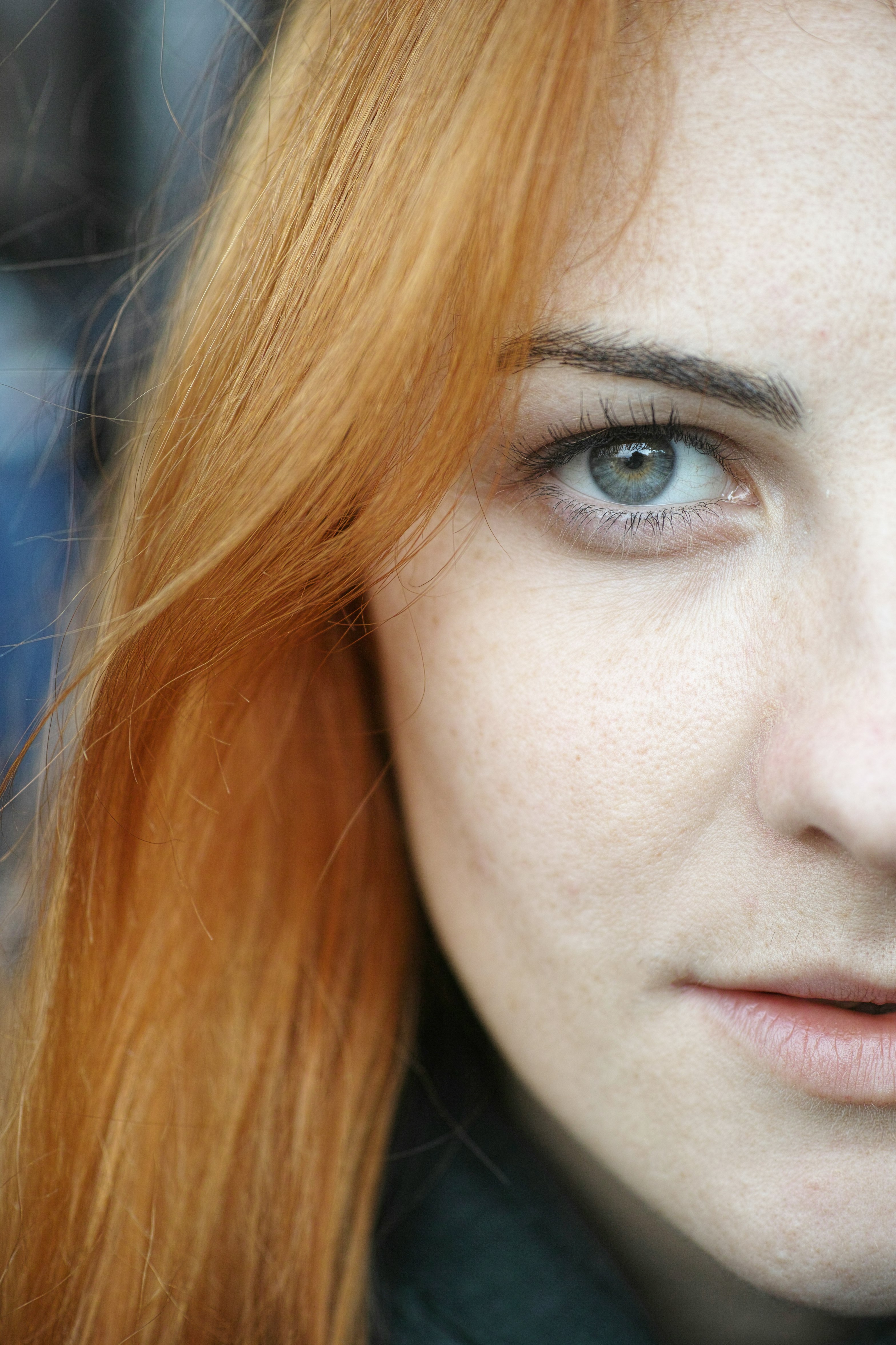 woman with brown hair and black eyes