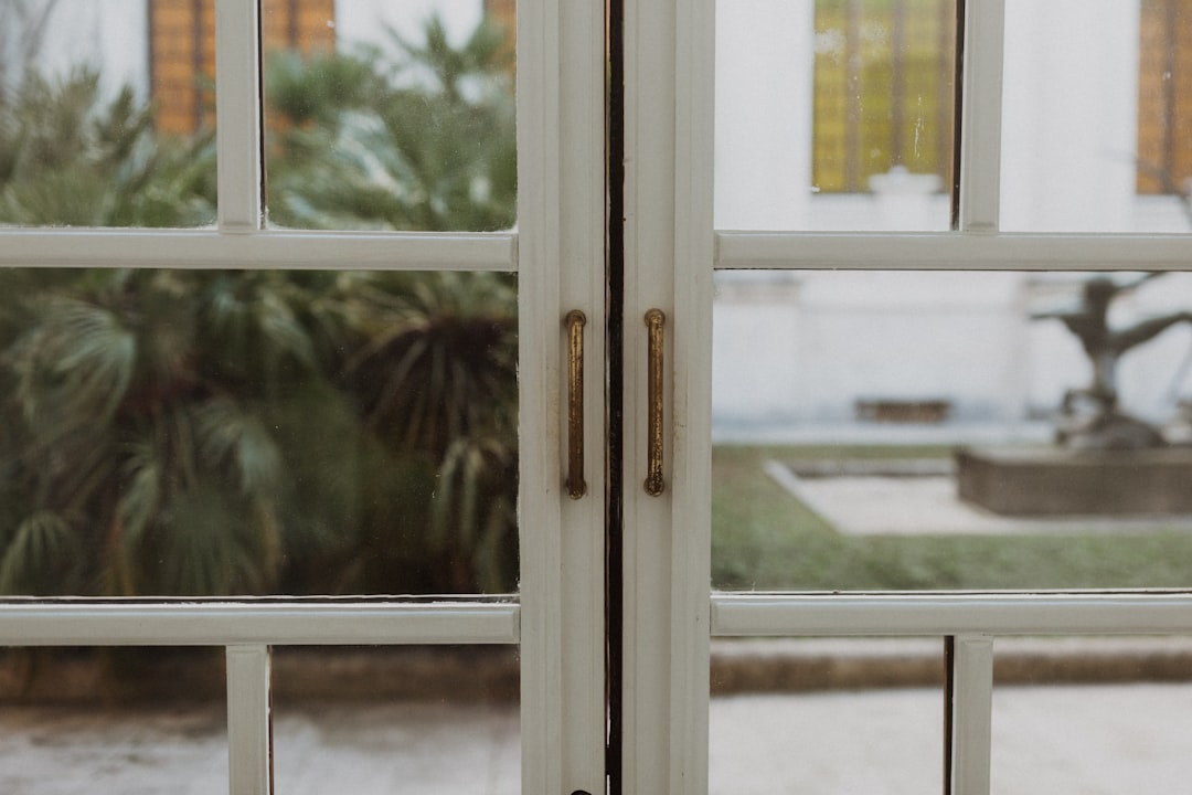 white wooden framed glass window