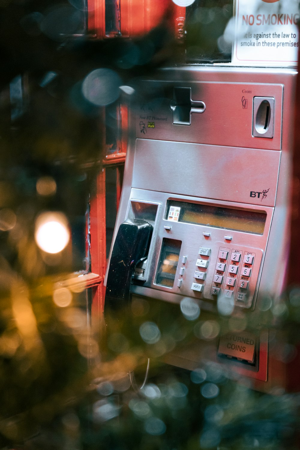 red and gray telephone booth