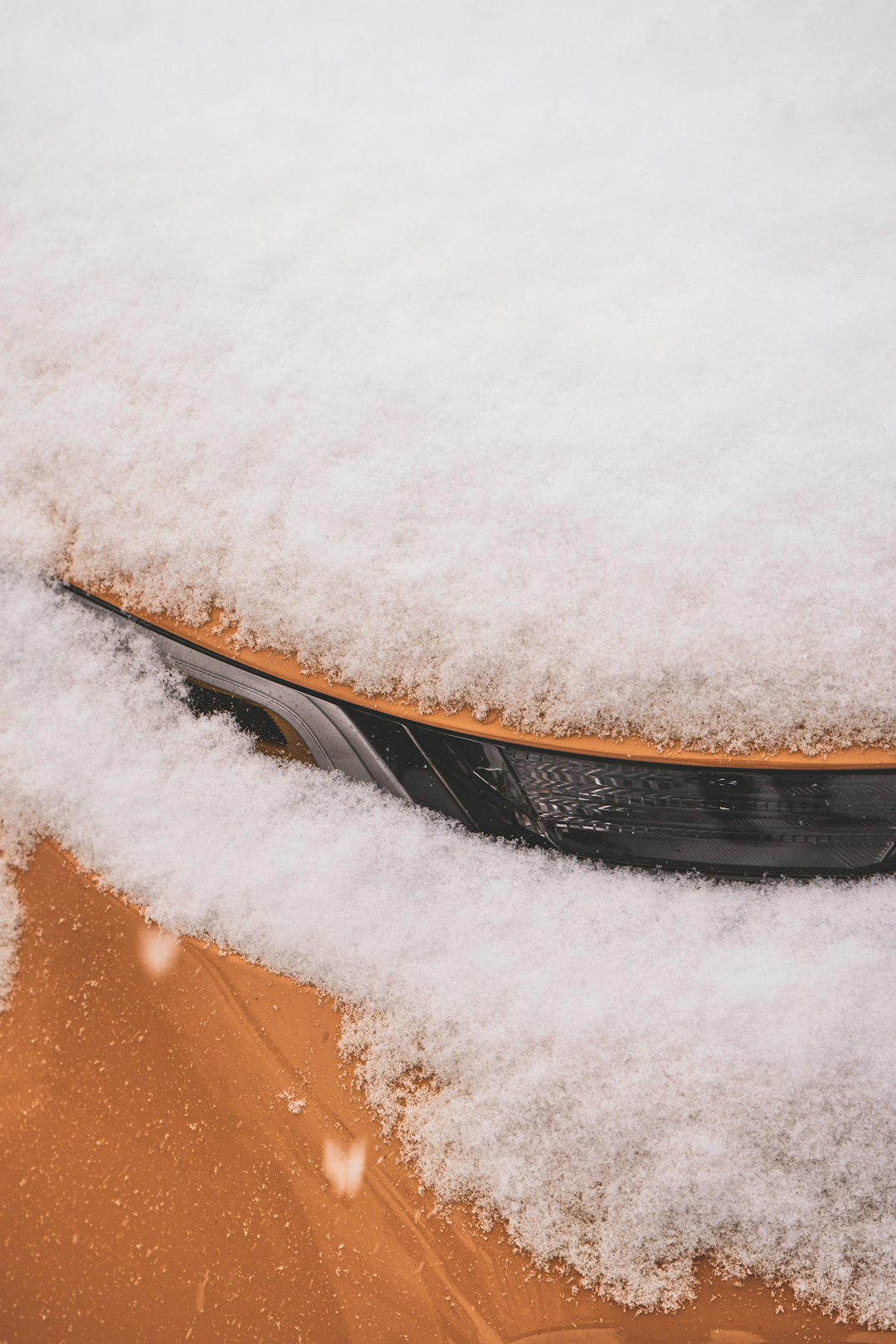 snow covered car during daytime