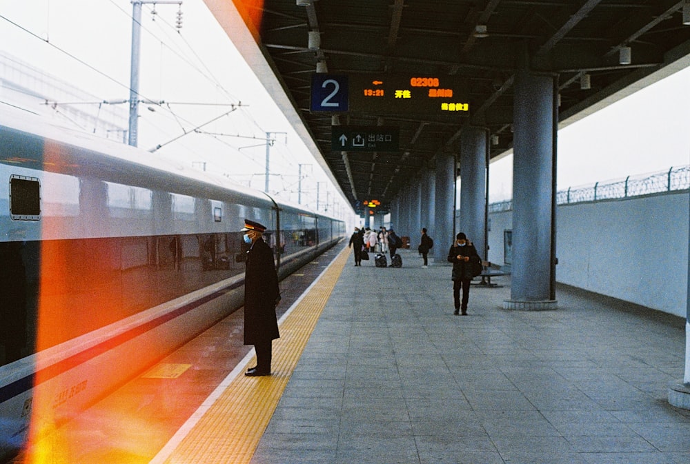 people walking on train station