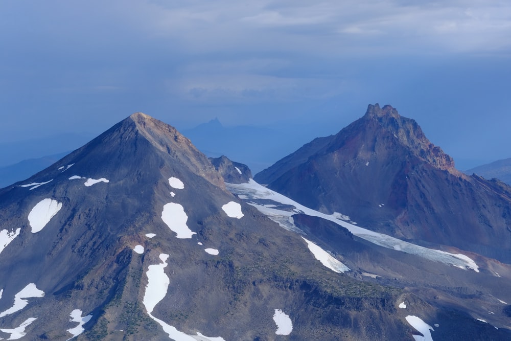 snow covered mountain under blue sky during daytime