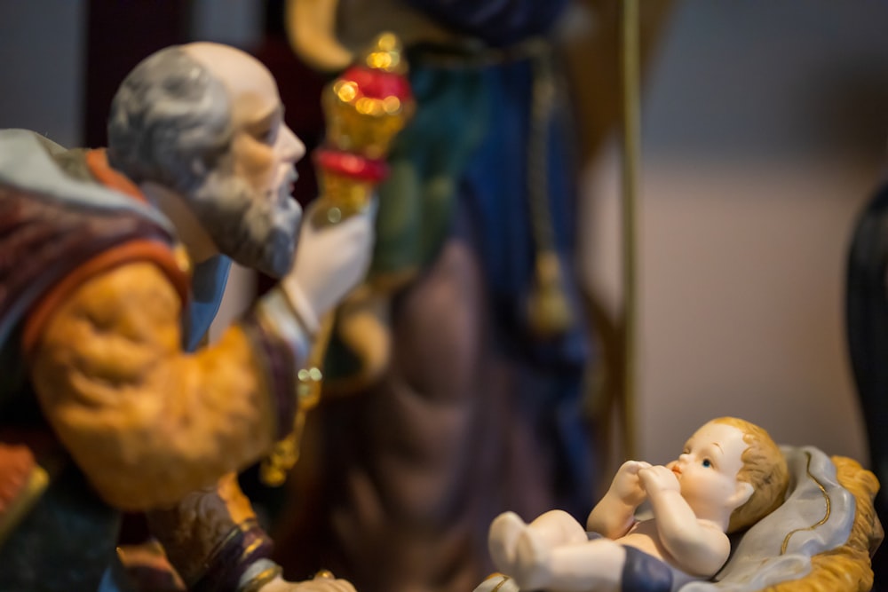 white and brown ceramic figurine