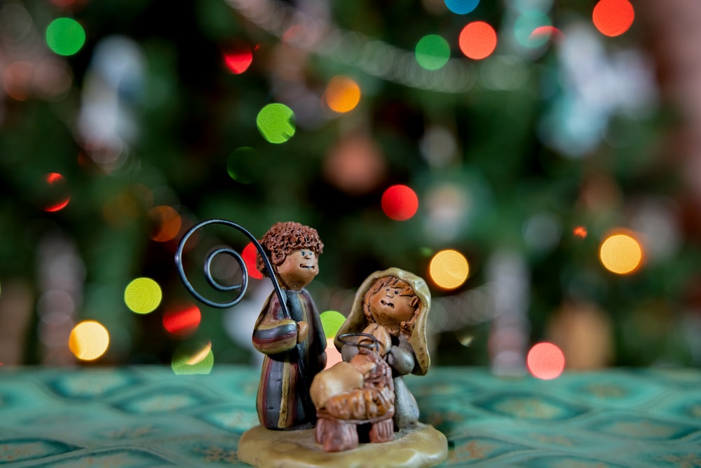 brown ceramic angel figurine on table