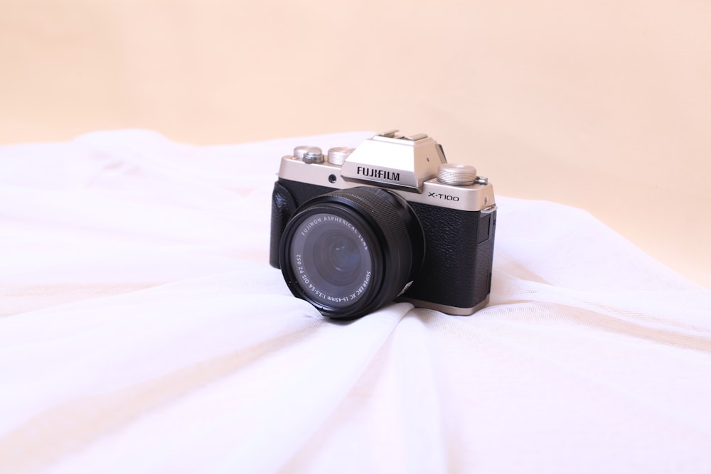 black and silver pentax camera