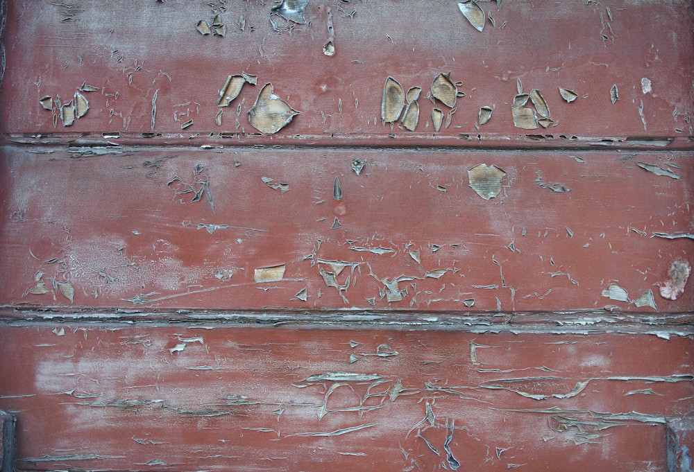 brown wooden door with gray steel door lever