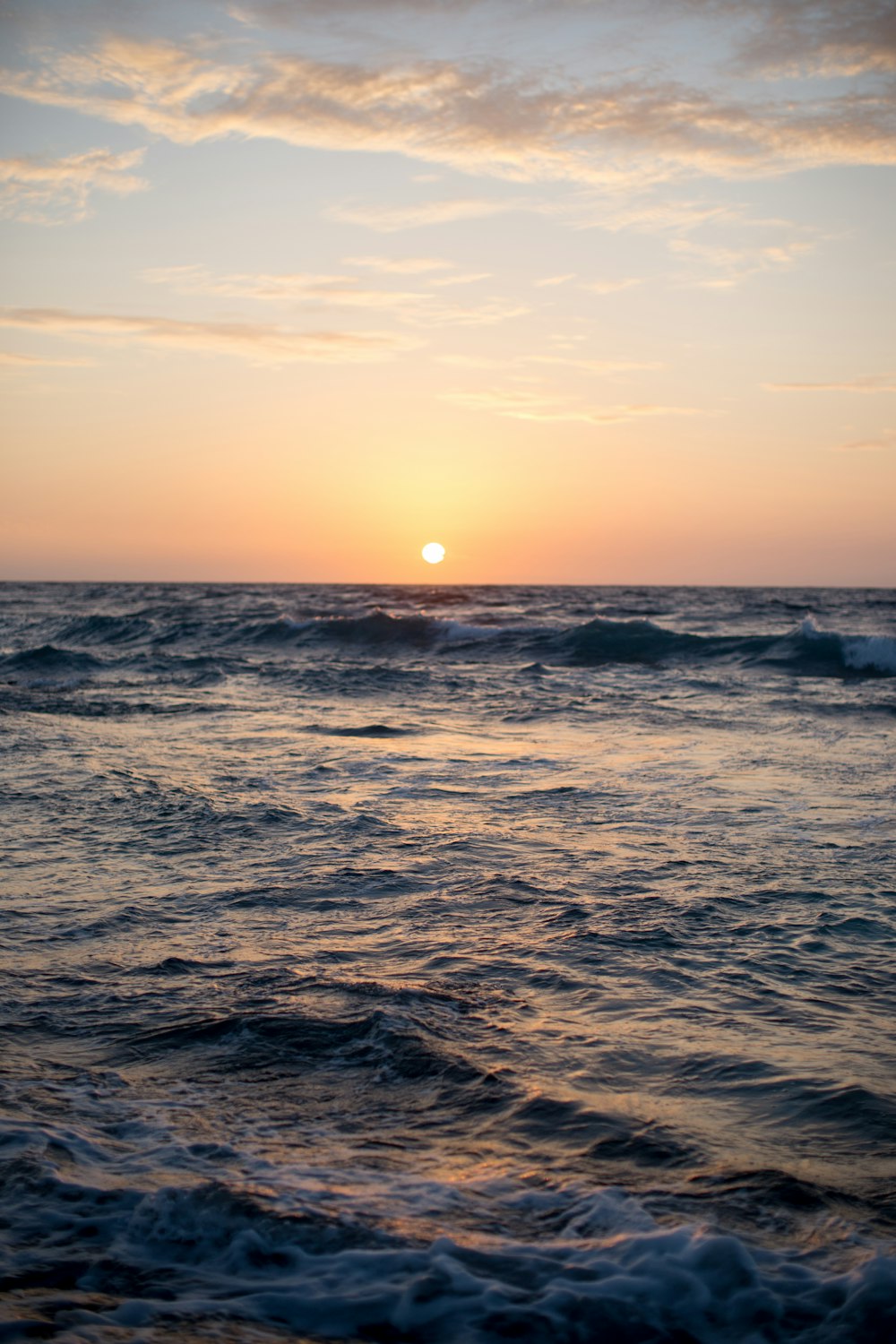 ocean waves during golden hour