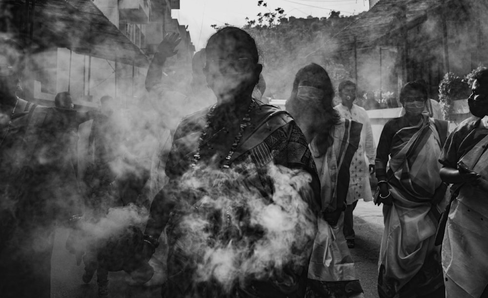 grayscale photo of man smoking