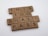Game tiles spell out a motivational phrase using wooden letter tiles typically found in word-based board games.