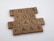 Game tiles spell out a motivational phrase using wooden letter tiles typically found in word-based board games.