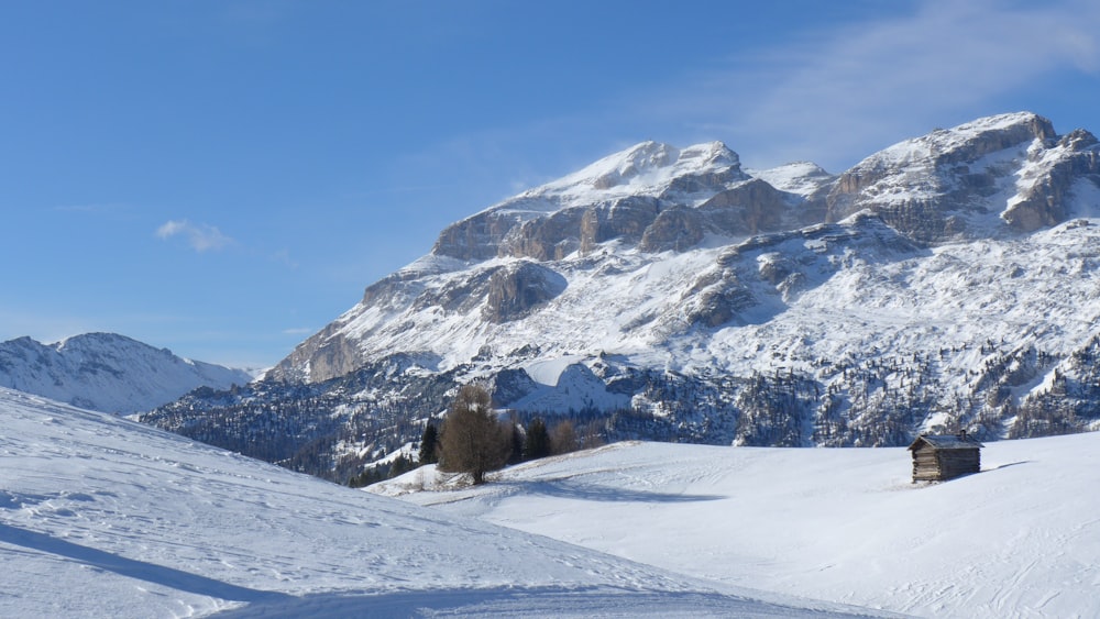 snow covered mountain under blue sky during daytime