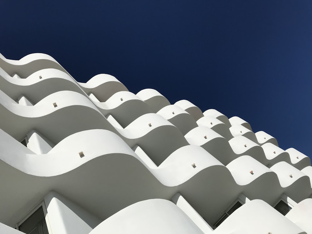 white concrete building under blue sky during daytime