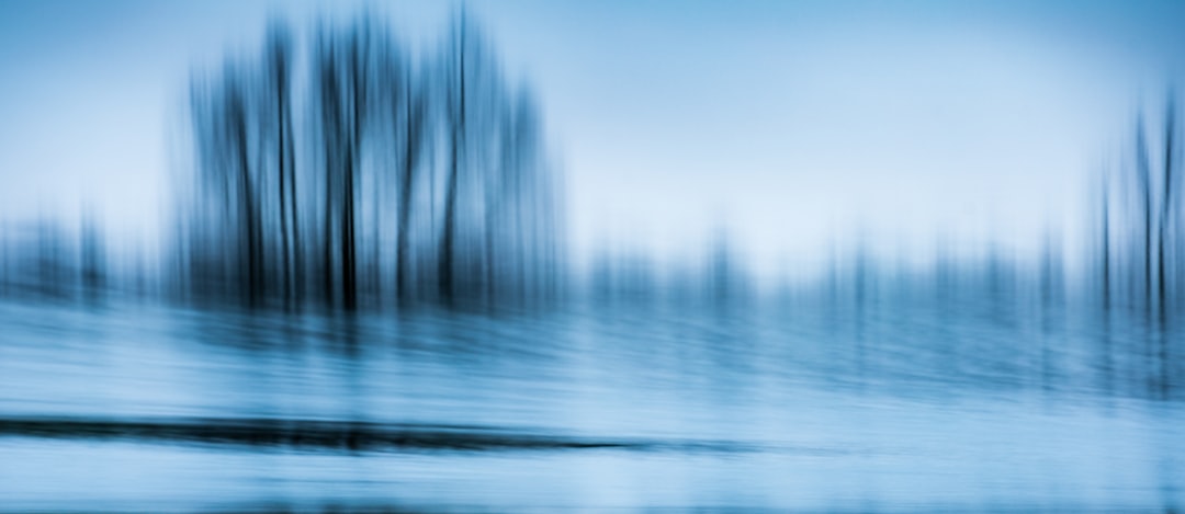 blue sky over body of water