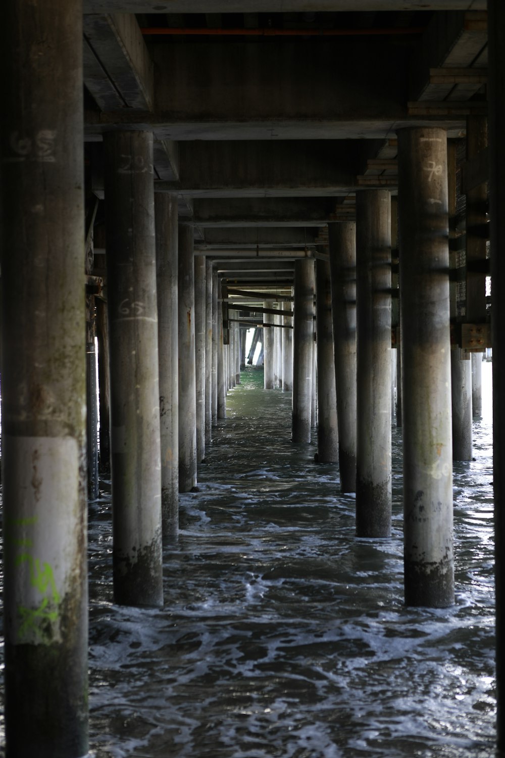 brown wooden dock on body of water during daytime