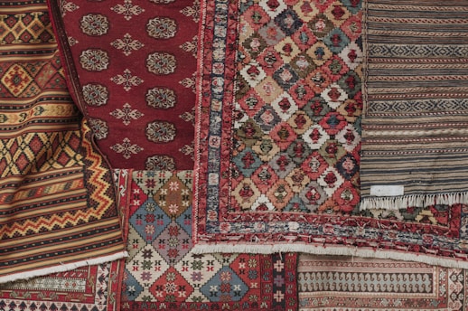 red white and black floral textile