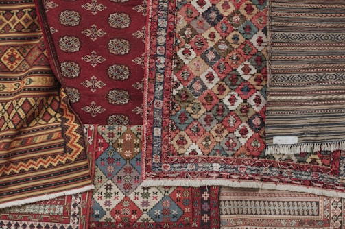 red white and black floral textile
