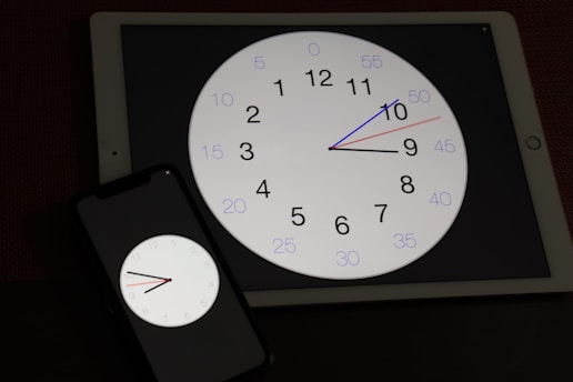 A clock showing 24 hours with a digital interface representing constant connectivity.