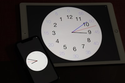 An analog clock morphing into a digital timer symbolizing time-saving technology.