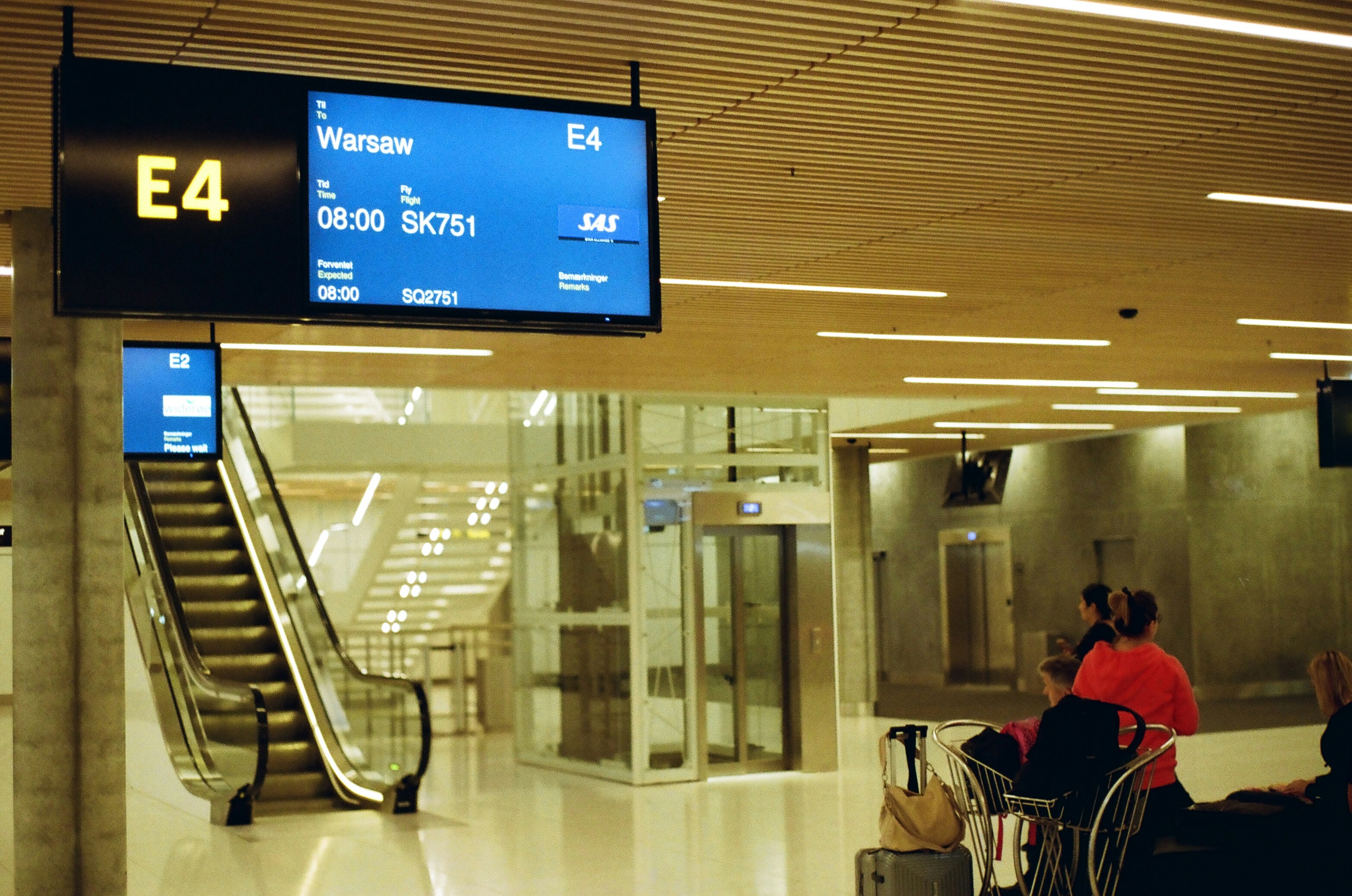 black flat screen tv turned on near glass window, 