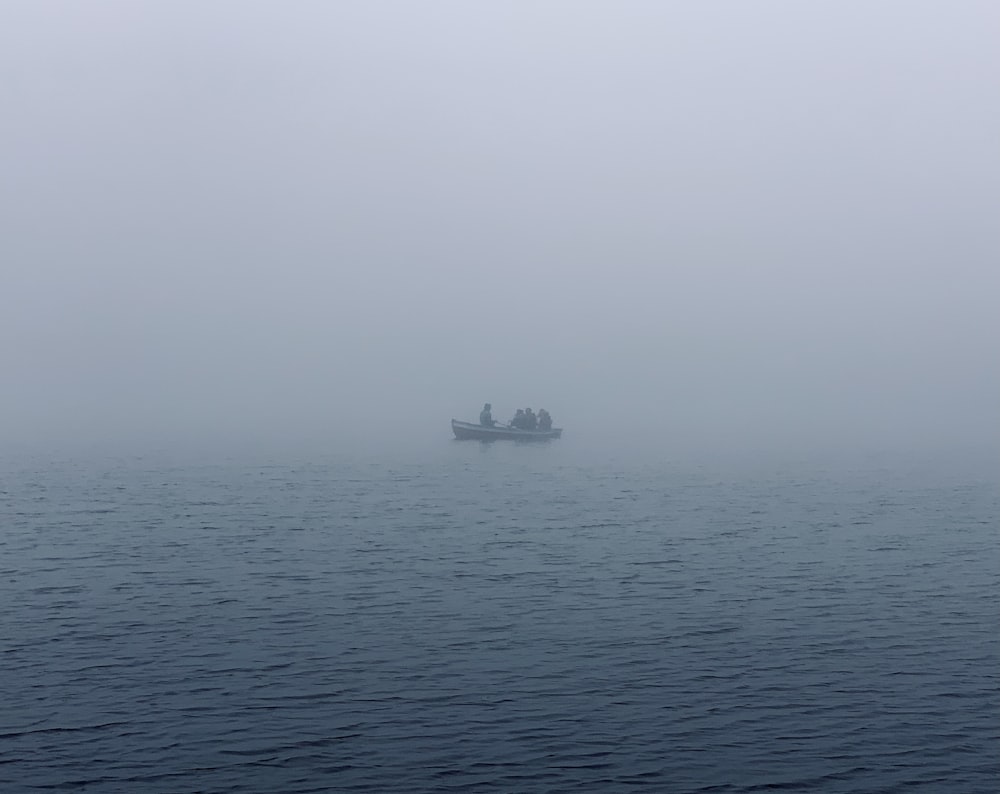 white ship on sea during daytime