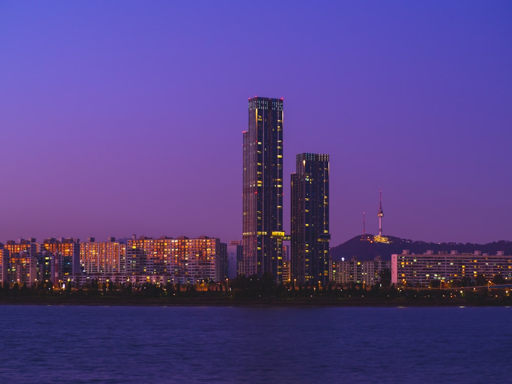 city skyline during night time