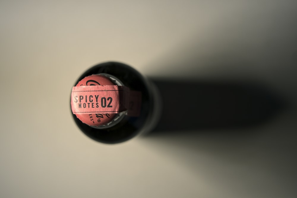black and red bottle cap