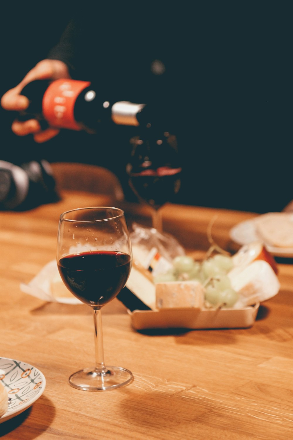 clear wine glass with red wine