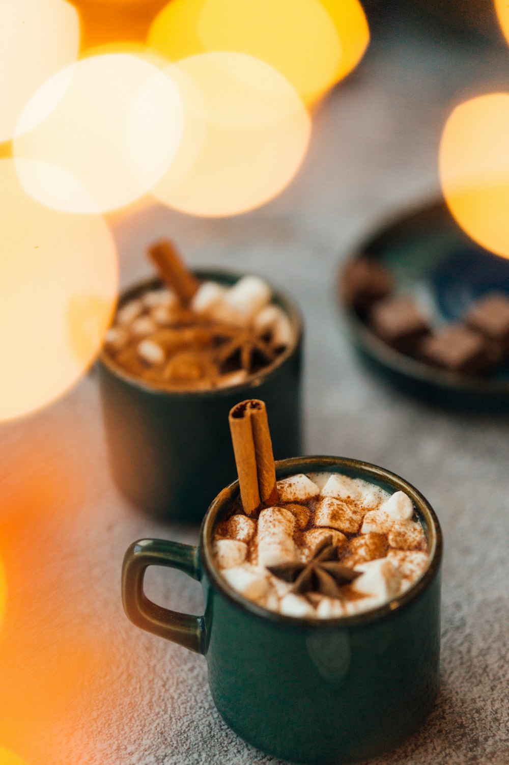 stainless steel mug with brown wooden stick