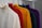 white and orange polo shirt