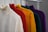 white and orange polo shirt