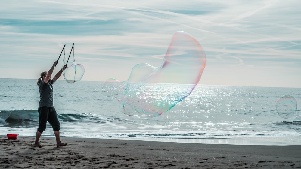 pink bubble on water during daytime