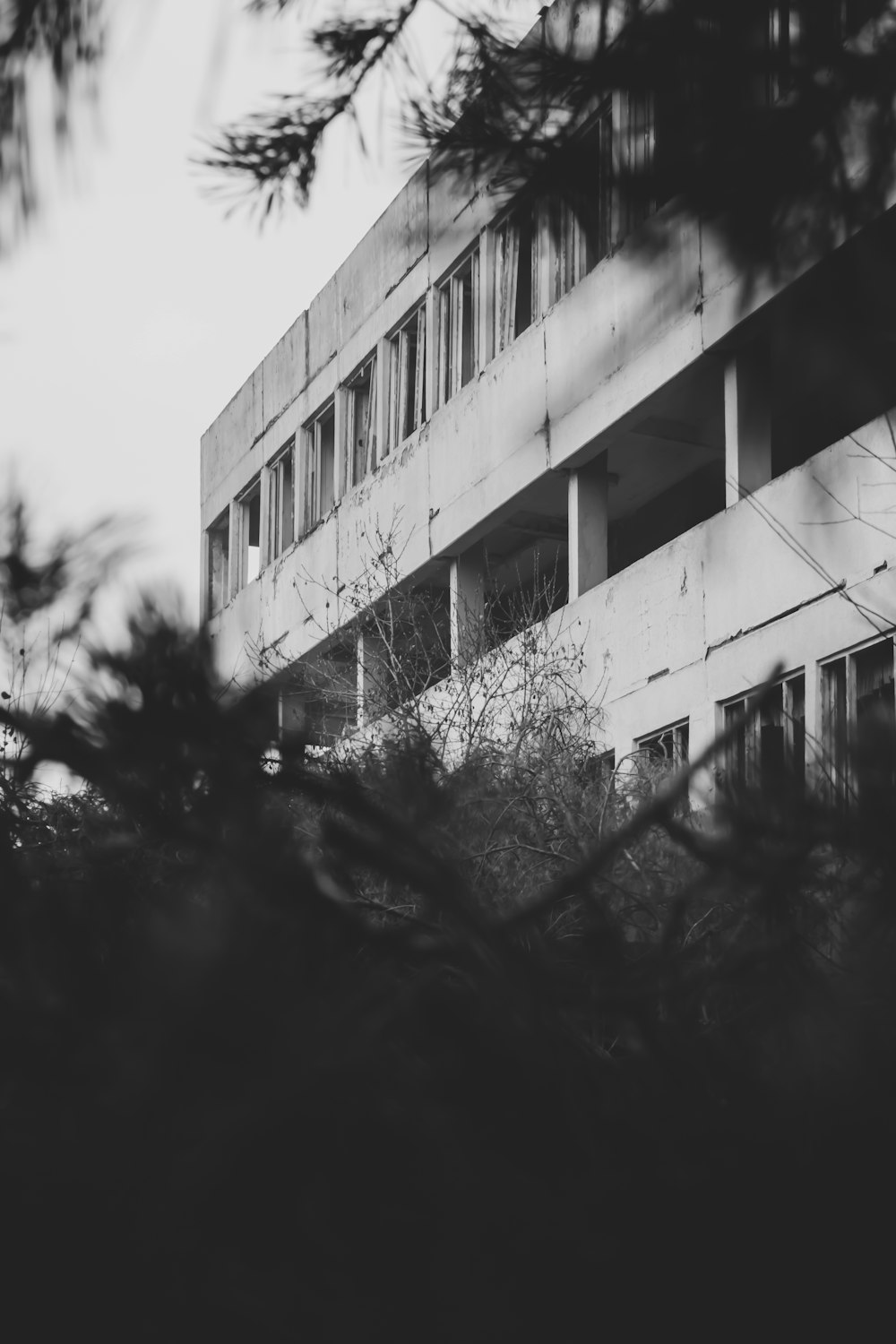 grayscale photo of concrete building