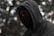 person in gray hoodie wearing black mask