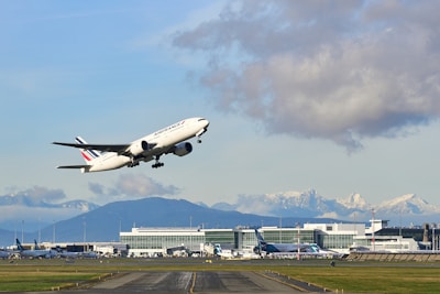 white passenger plane on airport during daytime