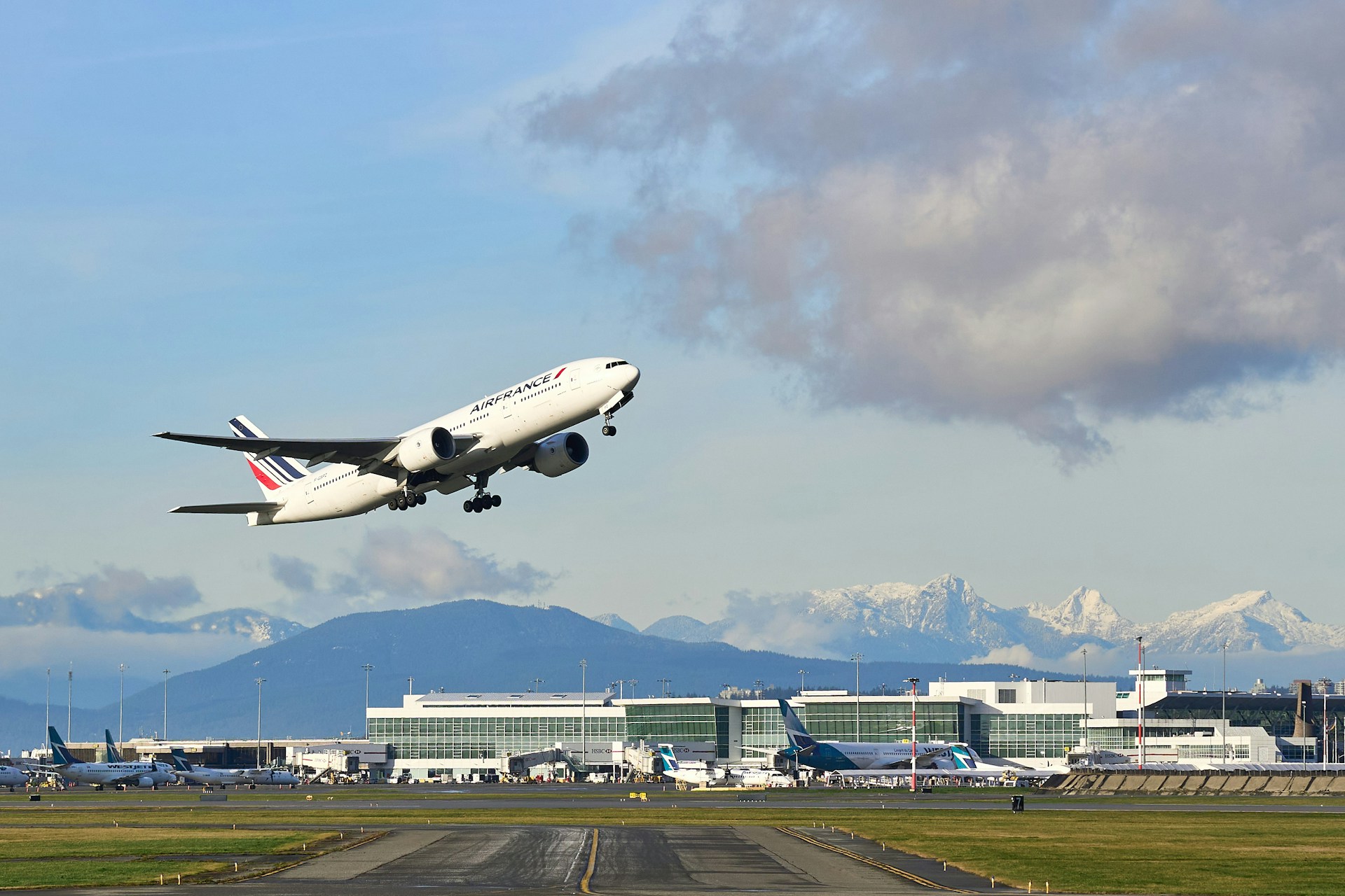white passenger plane on airport during daytime