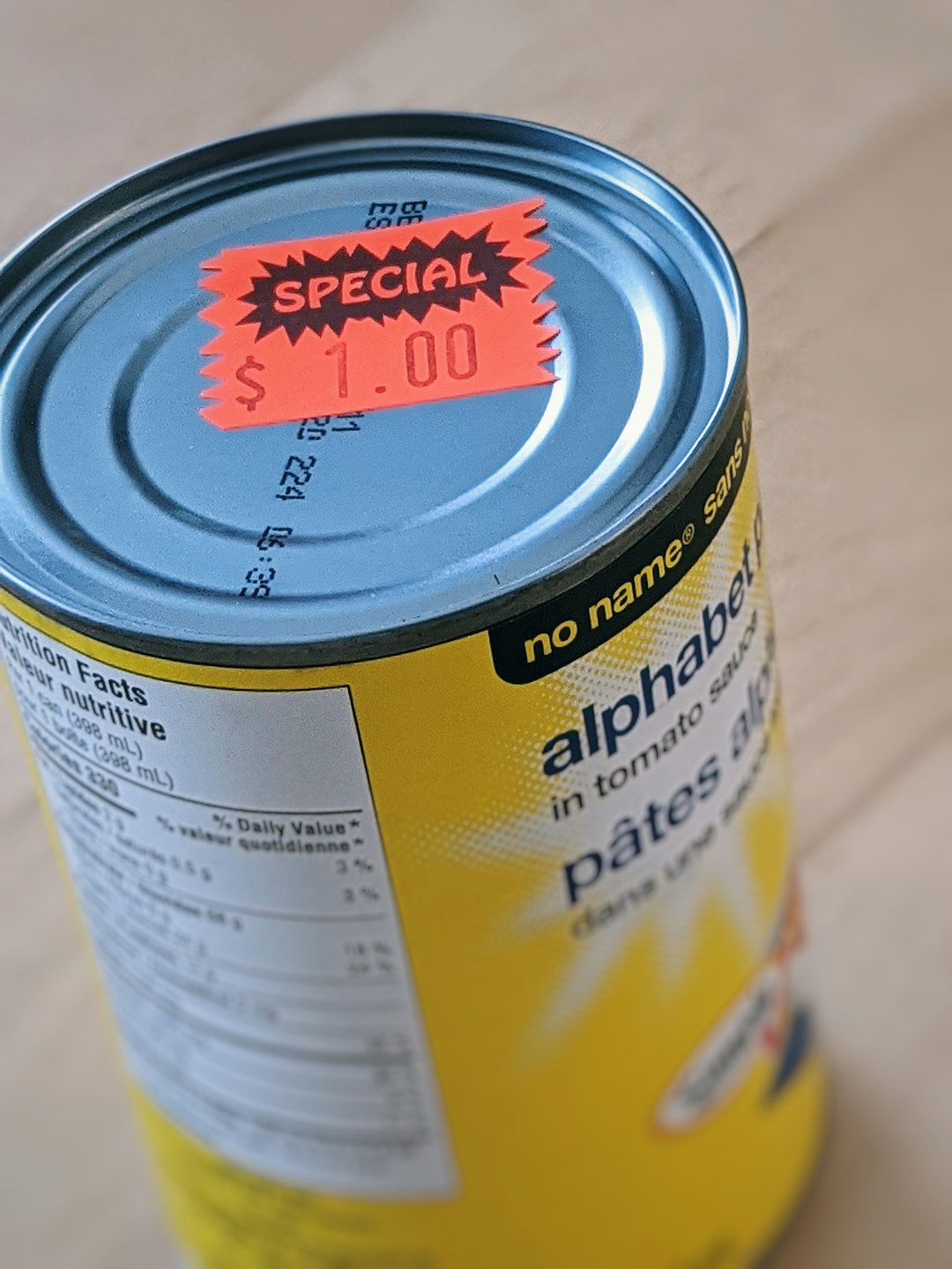 yellow and white labeled can