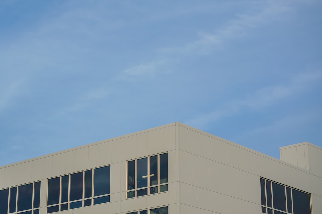 gray concrete building under blue sky during daytime