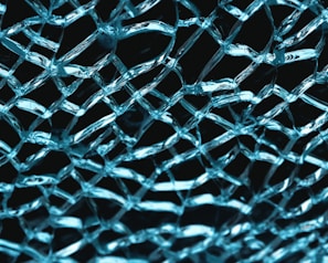 A close-up of a resin-infused glass piece highlighting its texture.