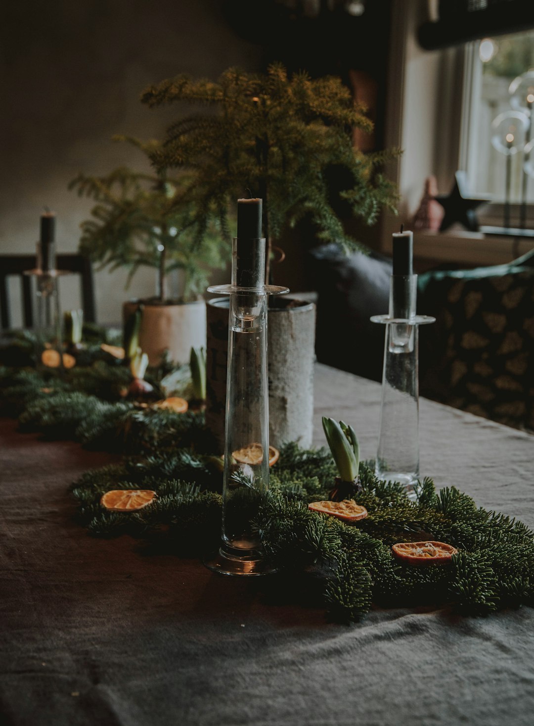 gray stainless steel candle holder on table