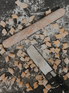 gray metal bar on gray and brown stone