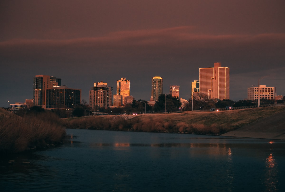 Fort Worth, Texas skyline at night with river reflection