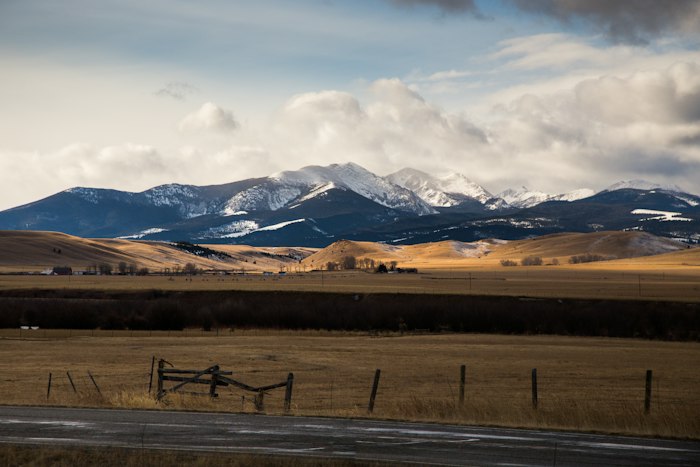 Ranch fence and open fields in the Gallatin Valley Montana