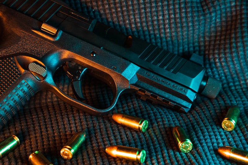 Semi-automatic pistol slide and frame — laser engraving surface