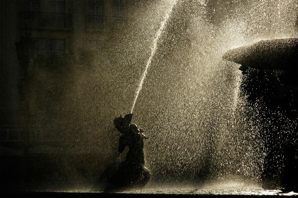 water fountain in grayscale photography