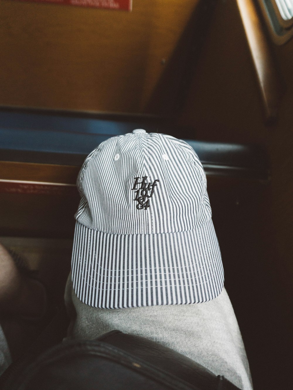 white and black under armour cap