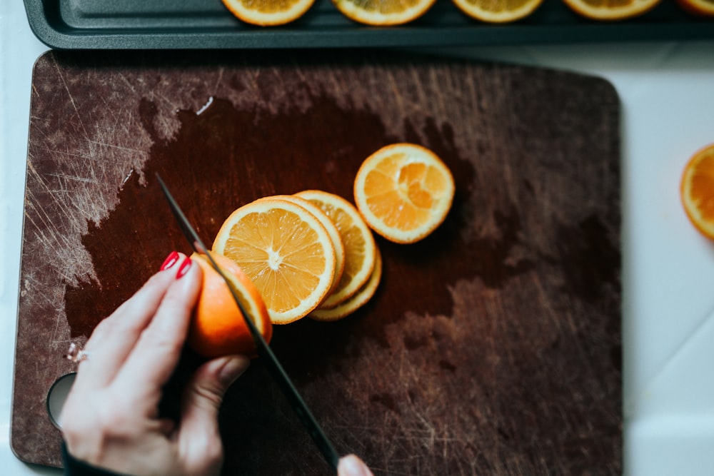 sliced lemon on brown wooden table