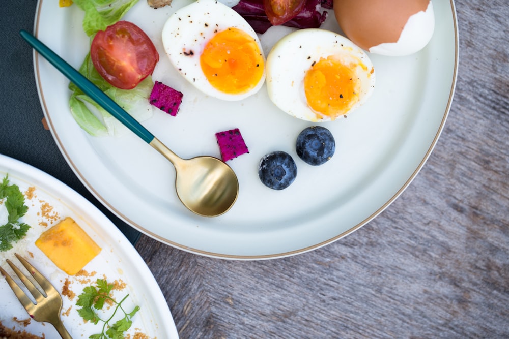 sunny side up egg on white ceramic plate