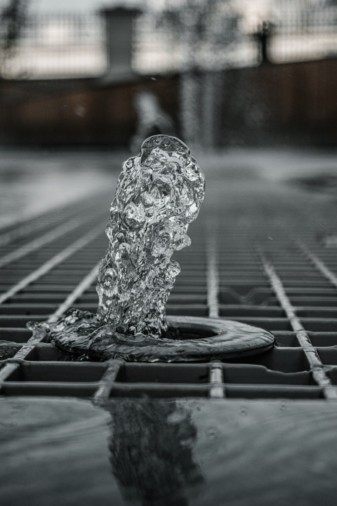 water fountain in grayscale photography